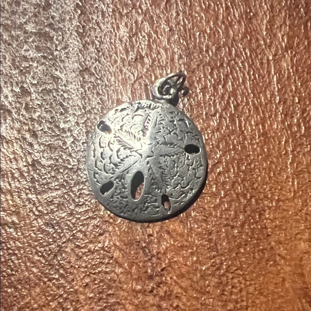 Elegant Silver Sand Dollar Pendant